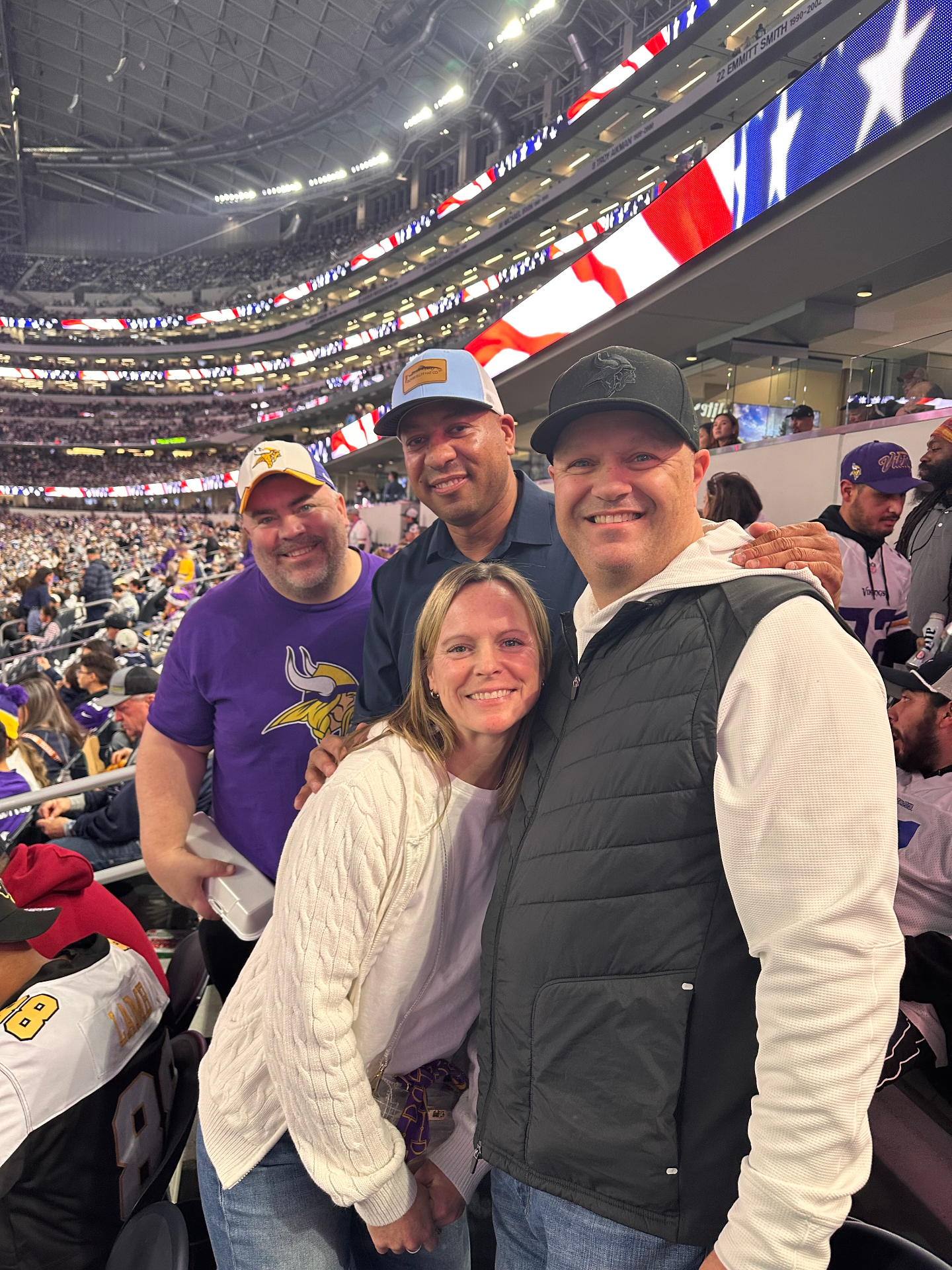 Coach Acosta with family at Vikings game
